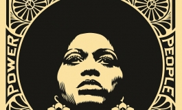 A black and red screenprint of a woman with an afro surrounded by a pattern of petals and peace signs and the phrases 
