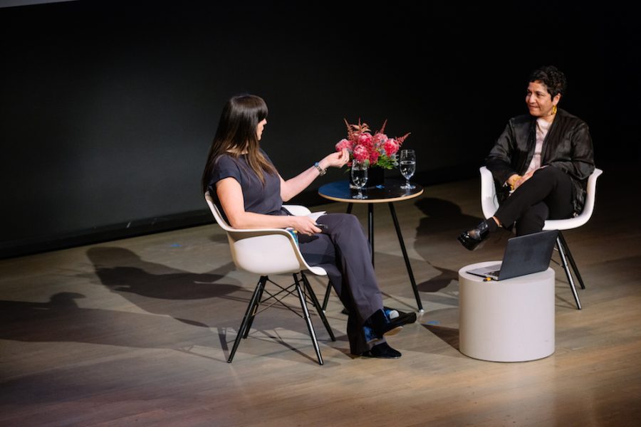Two women, curator Eva Respini and artist Huma Bhabha, sit on stage for a talk