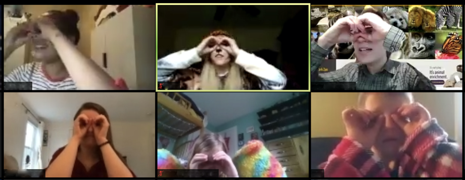 Screenshot of video call with 6 panels of children holding hands in front of eyes like binoculars. 