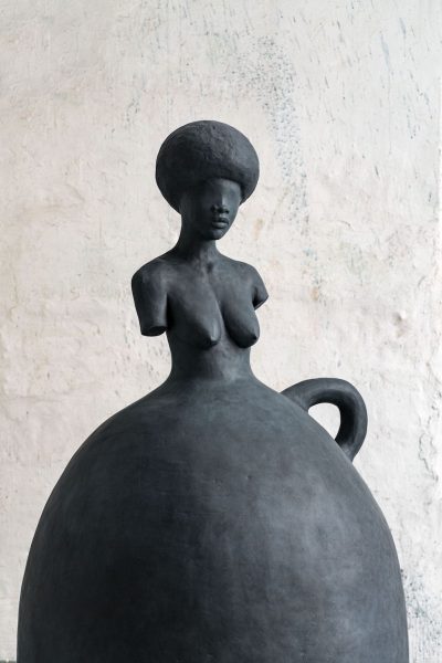 A sculpture by Simone Leigh of a female figure. 