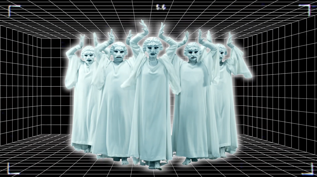A group of people painted white, dressed as stone statues, posing in a black and white gridded space
