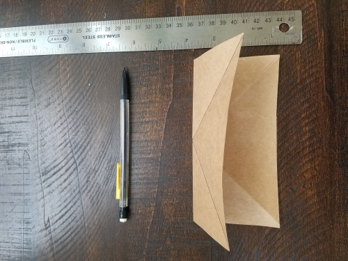 Folding a square piece of paper with triangular creases