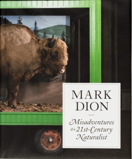 Book cover of a bison superimposed on the end of a green truck, titled 